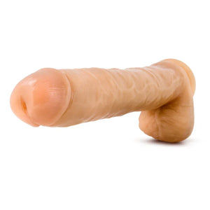 Realistic flesh-toned dildo with detailed veins and testicles on white background