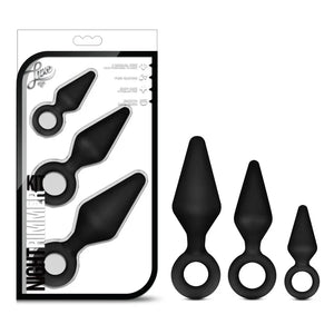 Black silicone anal plug set in three sizes with ring handles, packaged as Night Rimmer Kit