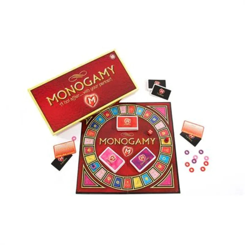 Monogamy board game with red and pink cards, colorful game board, dice, and game rings on white background