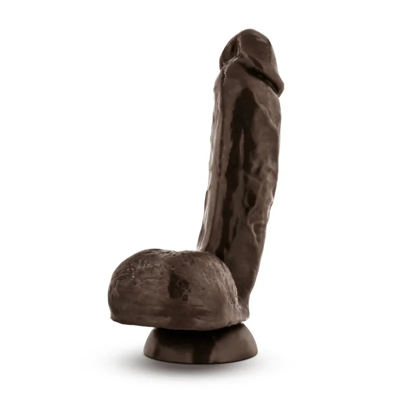 Realistic dark brown dildo with suction base, detailed textures on shaft and scrotum