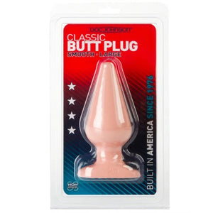 Doc Johnson Classic large smooth butt plug in beige, packaged with red and blue background