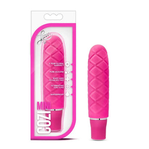 Mini Cozi pink silicone vibrator with textured diamond pattern, waterproof and body safe