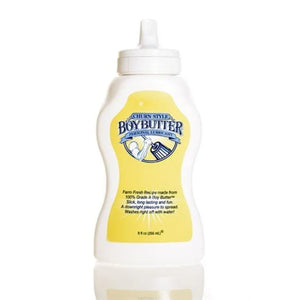 9 oz squeeze bottle of Churn Style Boy Butter personal lubricant with yellow label on white background