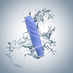 Mini periwinkle waterproof vibrator with textured design splashing in water