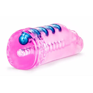 Transparent pink male masturbator with blue textured interior and ribbed design on white background