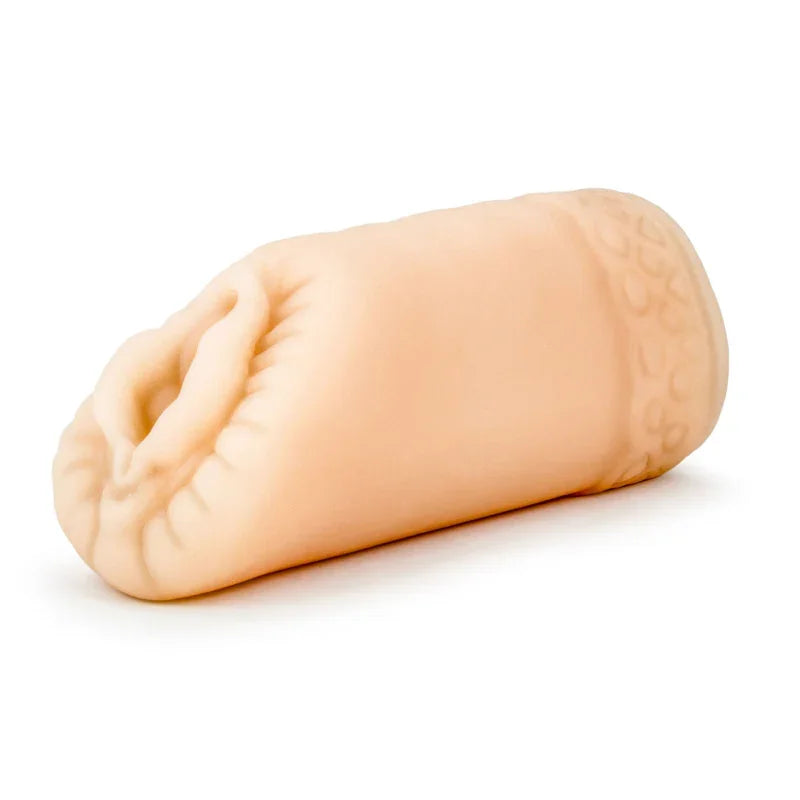 flesh-colored male masturbator sleeve with textured exterior, adult male pleasure aid