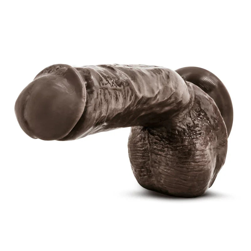 Realistic brown dildo with textured shaft and suction base on a white background