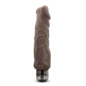 Brown textured vibrating dildo sex toy with clear round base on white background