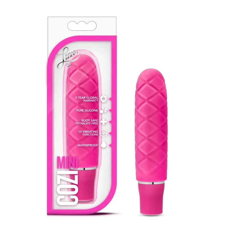 Mini Cozi pink silicone vibrator with textured diamond pattern, waterproof and body safe