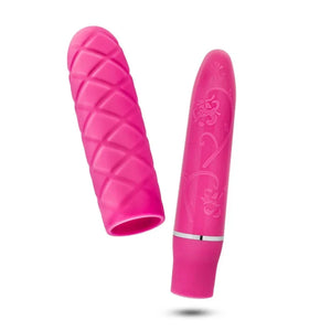 Pink Luxe Cozi Mini vibrator with floral engravings and textured silicone sleeve on white background